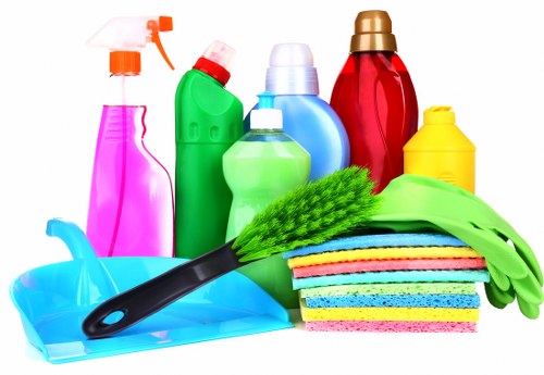 Cleaner in Cr0 preparing an office space for maintenance