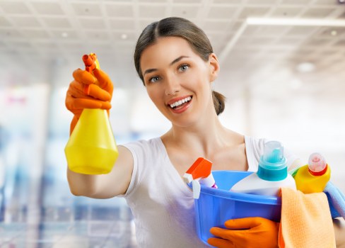 Professional carpet cleaners in Cr0 removing deep dirt from a living room carpet