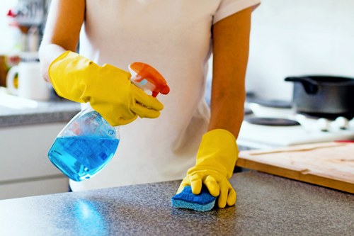 Office cleaning team servicing desks and shared spaces